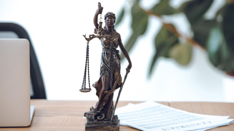 Doctor reviewing investment losses with securities lawyer regarding financial fraud or broker misconduct